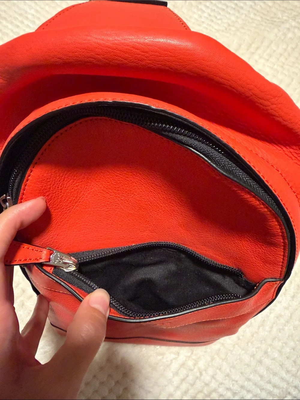 NWT Coach Orange Pebble Leather Crossbody Sling with Black Strap